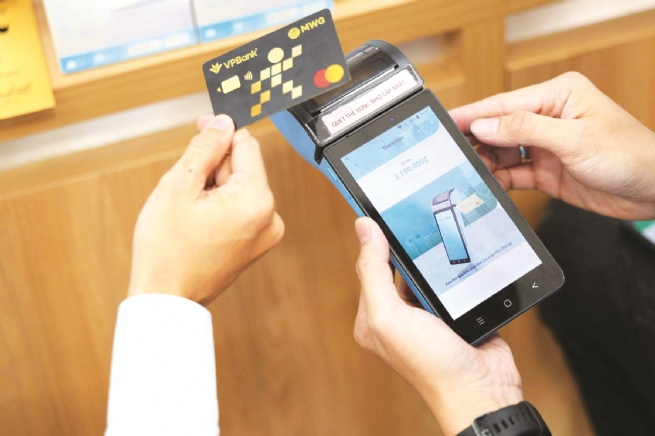 Thúc đẩy thanh toán không dùng tiền mặt để nâng cao hiệu quả quản lý thuế